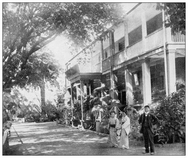 istock Antique black and white photograph: Honolulu residence and Japanese servants, Hawaii 1329046552