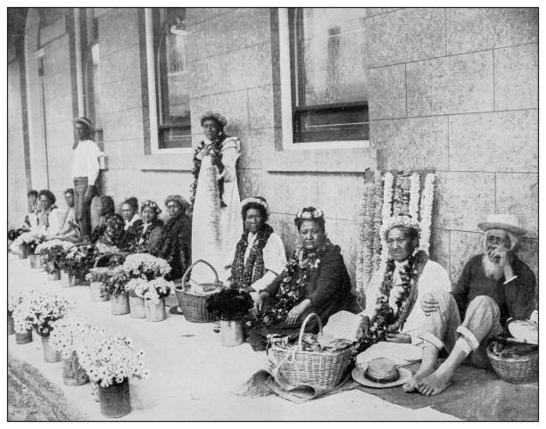 istock Antique black and white photograph: Flower women, Hawaii 1329046671
