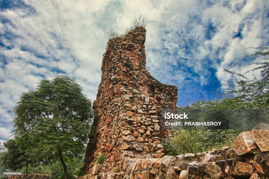 Ruins of Siri Fort During 1297 and 1307 Alauddin Khilji laid the foundation of SIRI the second city of Delhi. The the remaining ruins of Siri Fort was built by Seljuk dynasty. It was built to defend against the Mongol invasions Aerial View Stock Photo