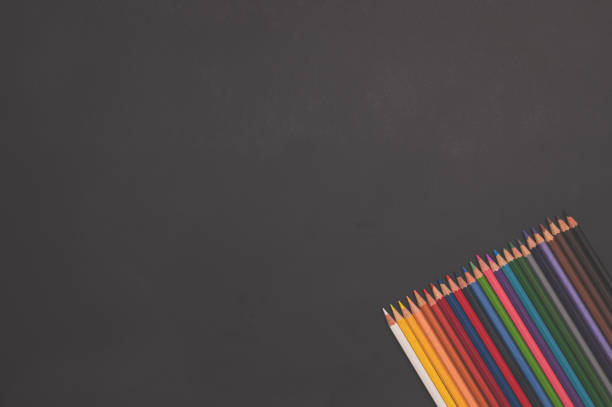 istock Back to school and education concept Multi colored pencils And white paper 1329047765