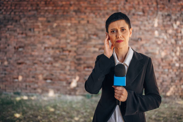 istock Female TV reporter 1329052230