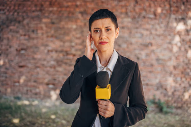 istock Female TV reporter 1329052271