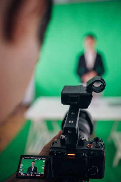 istock Woman anchor reporting news in studio 1329052861