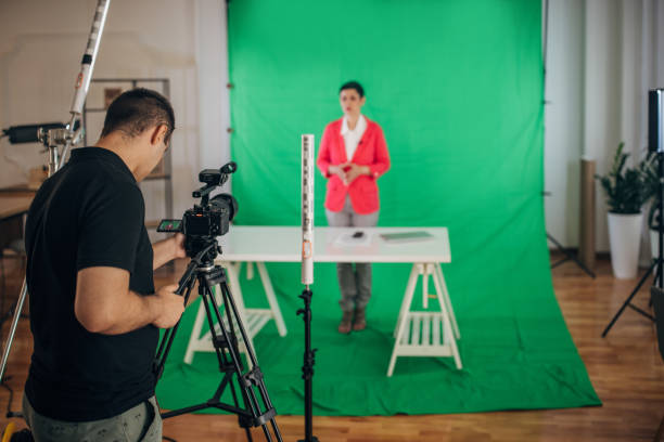 istock Woman anchor reporting news in studio 1329052950