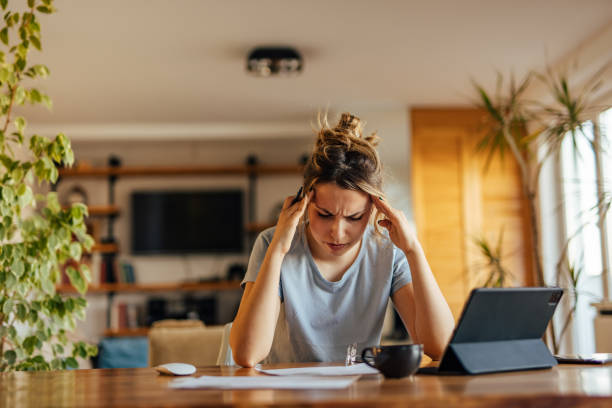 istock Adult woman, trying to concentrate on work. 1329055501