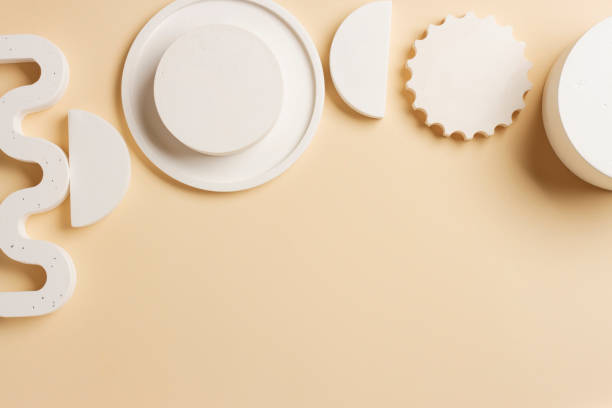 istock Composition of plaster decorations of different geometries on a delicate background 1329056165