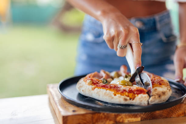 istock Pizza, being served to the guests. 1329058396