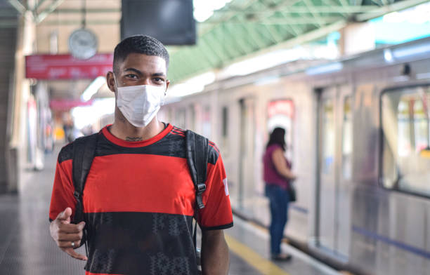 istock Young man at a subway station 1329060720