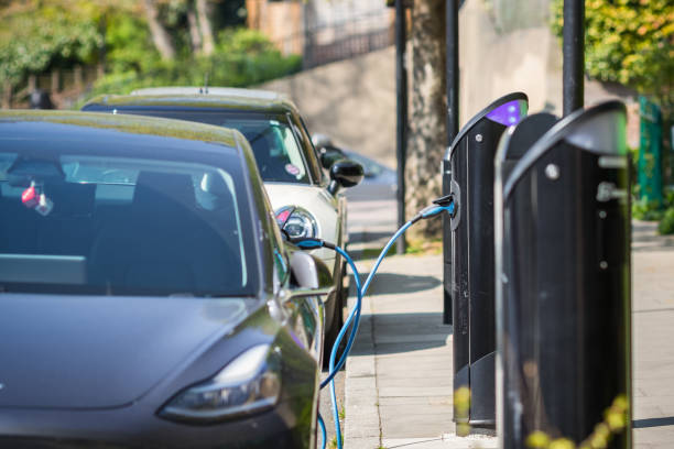 Electric car charging at a charging point around Archway area in London, England stock photo