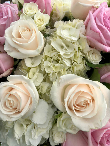 Close up of a wedding bouquet with pastel flowers stock photo