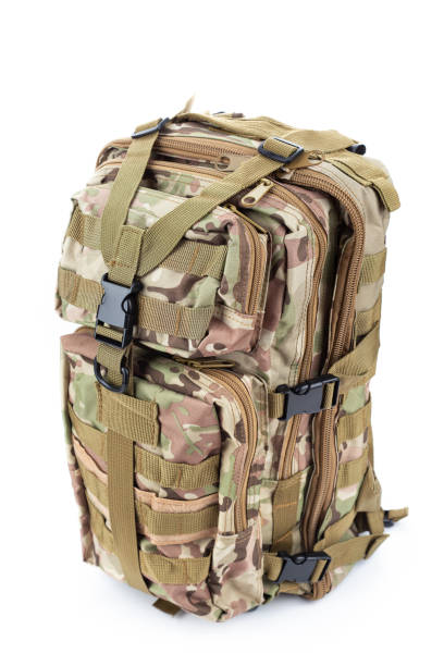 istock Military backpack of khaki color on a white background 1329068091