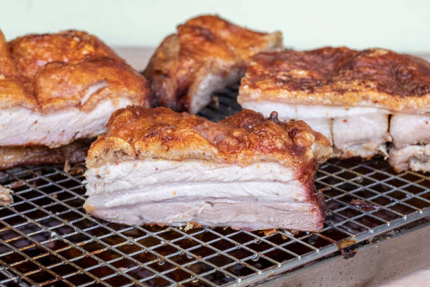 istock CRISPY PORK BELLY - Freshly cooked Roast Pork, on an iron tray. 1329068103
