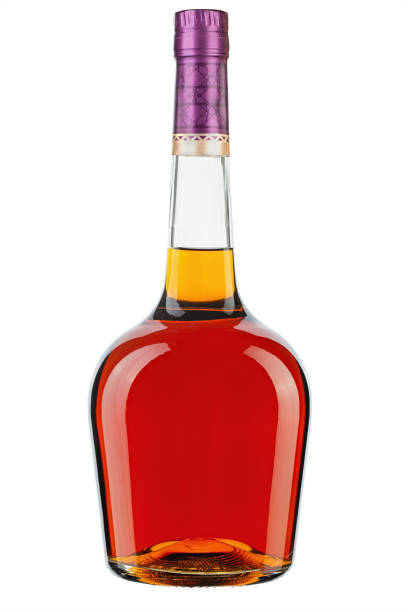 istock Full bottle of cognac  isolated on white background. Full depth of field. 1329068116