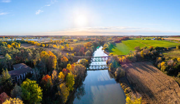istock Aerial Railway Bridge and Conestogo River at dusk, St. Jacobs, Canada 1329069614