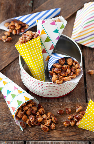 Roasted almonds with cinnamon stock photo