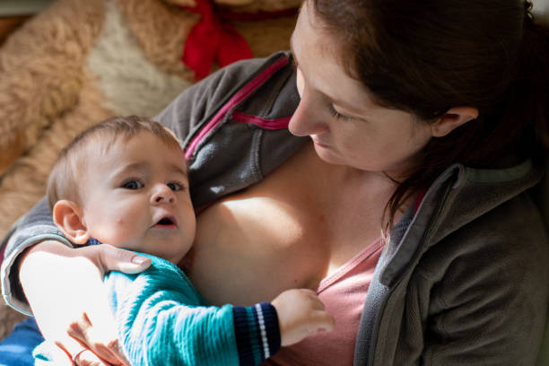 istock Baby and mother. 1329073919