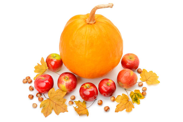 istock Pumpkin, apples, hazelnut, yellow maple leaves isolated on white background. Autumn composition of seasonal fruits. 1329081751