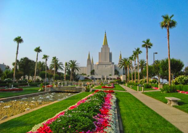 The iconic LDS Conference Center in Salt Lake City, Utah, a grand architectural landmark used for gatherings and religious events. This striking modern structure, built with granite, stands as a symbol of faith and community.