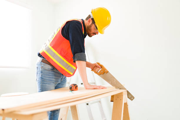 istock Male engineer cutting wood with a saw 1329096132