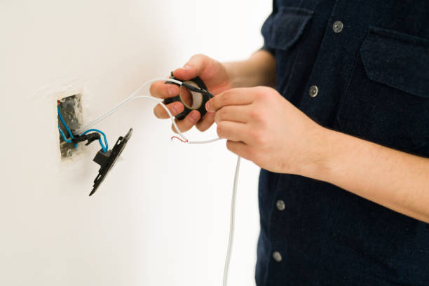 istock Handyman putting tape on broken cables 1329096462