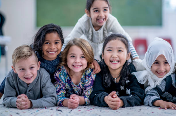 istock Cluster of happy elementary school kids 1329100914