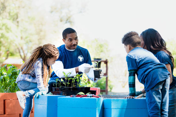 At community garden, family learns about plants