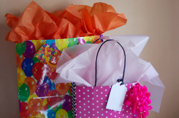 istock happy bright birthday bags close up 1329102440