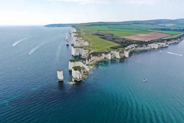 Old Harry Rocks from air Aerial shot of Old Harry Rocks along Jurassic Coast old harry rocks stock pictures, royalty-free photos & images