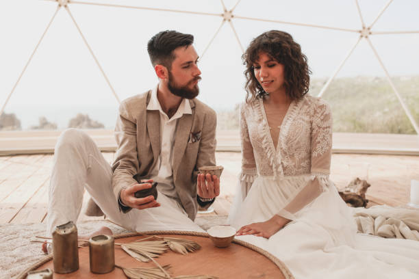 istock Tea ceremony at a boho wedding. Bride and groom in boho. 1329113314