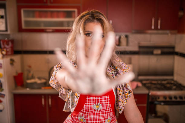 istock Woman with floury hands 1329123648