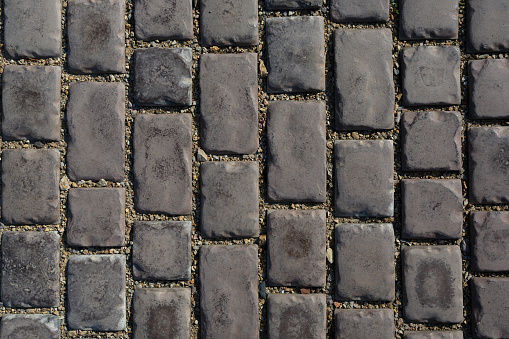 Stone background and texture - gray paving stone paving stones, close up