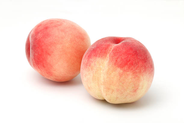 istock Fresh organic peaches, ripe Japanese peaches. 1329153722