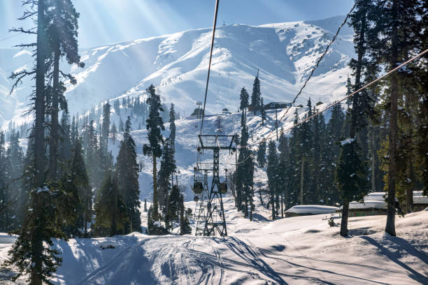 Gandola cable car in Gulmarg Kashmir India during the winter season. Gandola cable car in Gulmarg Kashmir India during the winter season. cable car photos stock pictures, royalty-free photos & images