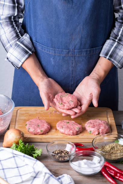 istock Raw beef and pork cutlets preparation at home 1329172301