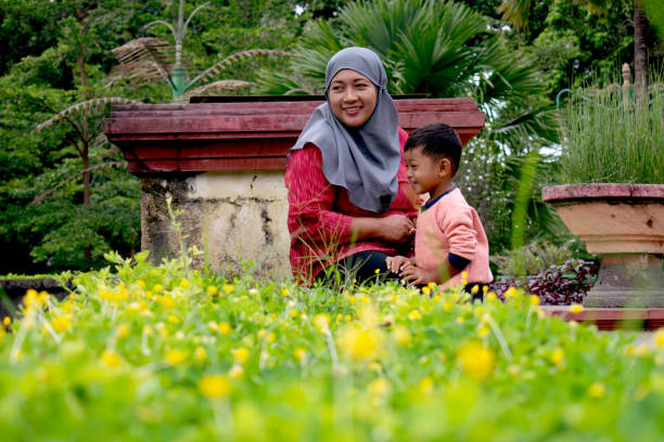 istock A mother and her son smile happily 1329176760