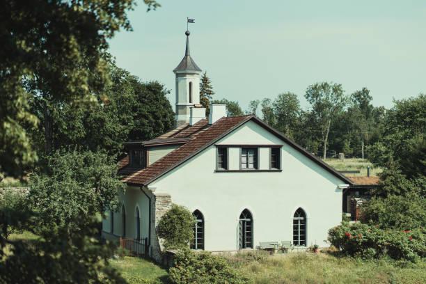 istock Old building near a white water mill 1329179348