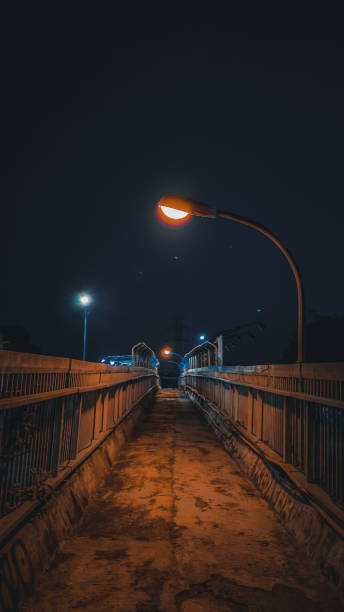 istock Tone orange of night on a bridge 1329180597