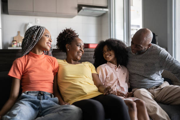 istock Happy family together at home 1329182097