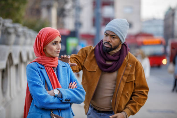 istock Multi-Ethnic Couple in Love is Going Through Serious Relationship Problems During the Walk in the City. 1329182241