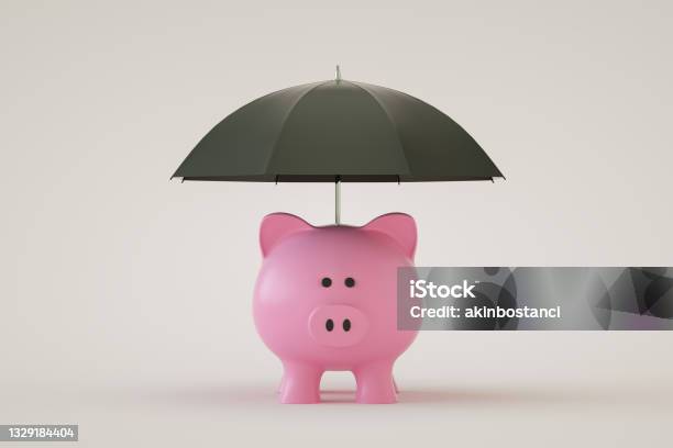 Piggy Bank With Umbrella Financial Insurance Protection Stock Photo - Download Image Now