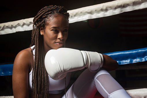 portrait of young black woman in boxing ring