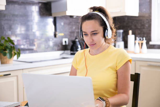 istock Young woman working at home 1329188908