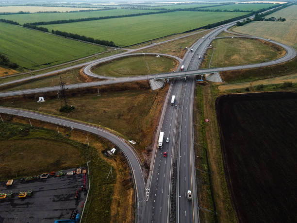 istock Road junction at sunset. Aerial view 1329189560