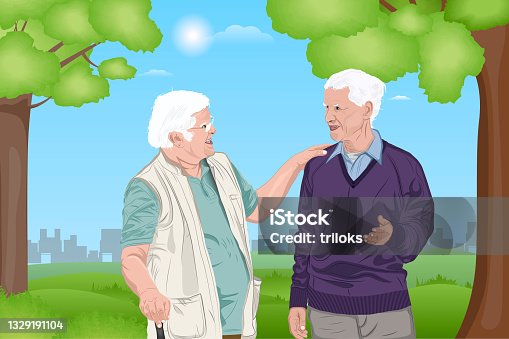 istock Two retired elderly men walking at park 1329191104