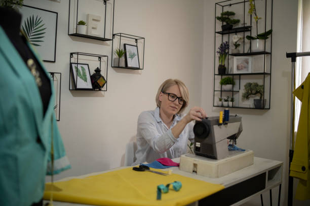 istock Young woman is sewing 1329193225
