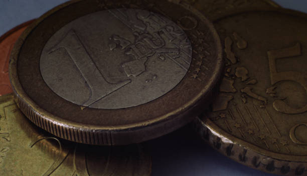 istock Macro one euro and other euros coins 1329195461