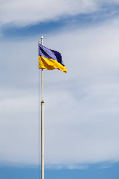 istock National Ukrainian flag against sky 1329196406