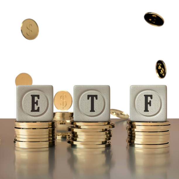 istock Cubes with the inscription ETF stand on stylized coins with a dollar sign. 3D rendering. Blank for design. Layout. Abstraction. Financial concept. 1329201055