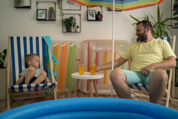 istock Family spending vacation at home 1329203394