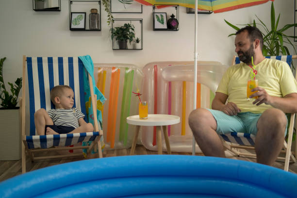 istock Family spending vacation at home 1329203403